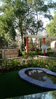 A serene outdoor space with ceramic garden decor elements.