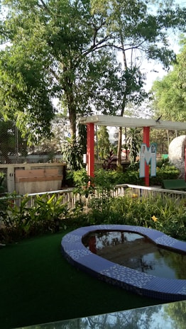 A serene outdoor space with ceramic garden decor elements.
