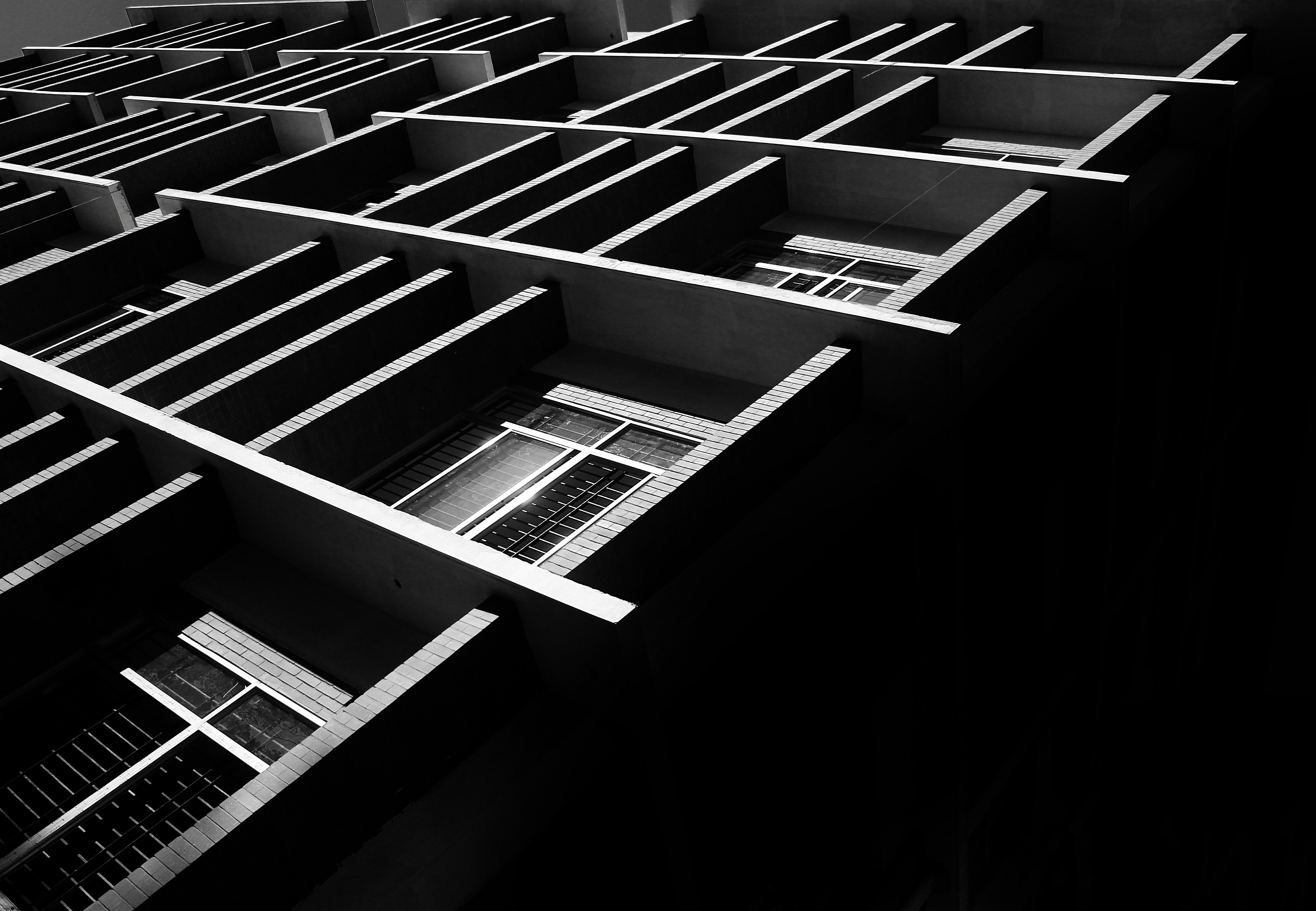 A black and white photo of a building photo Free Texture Image on
