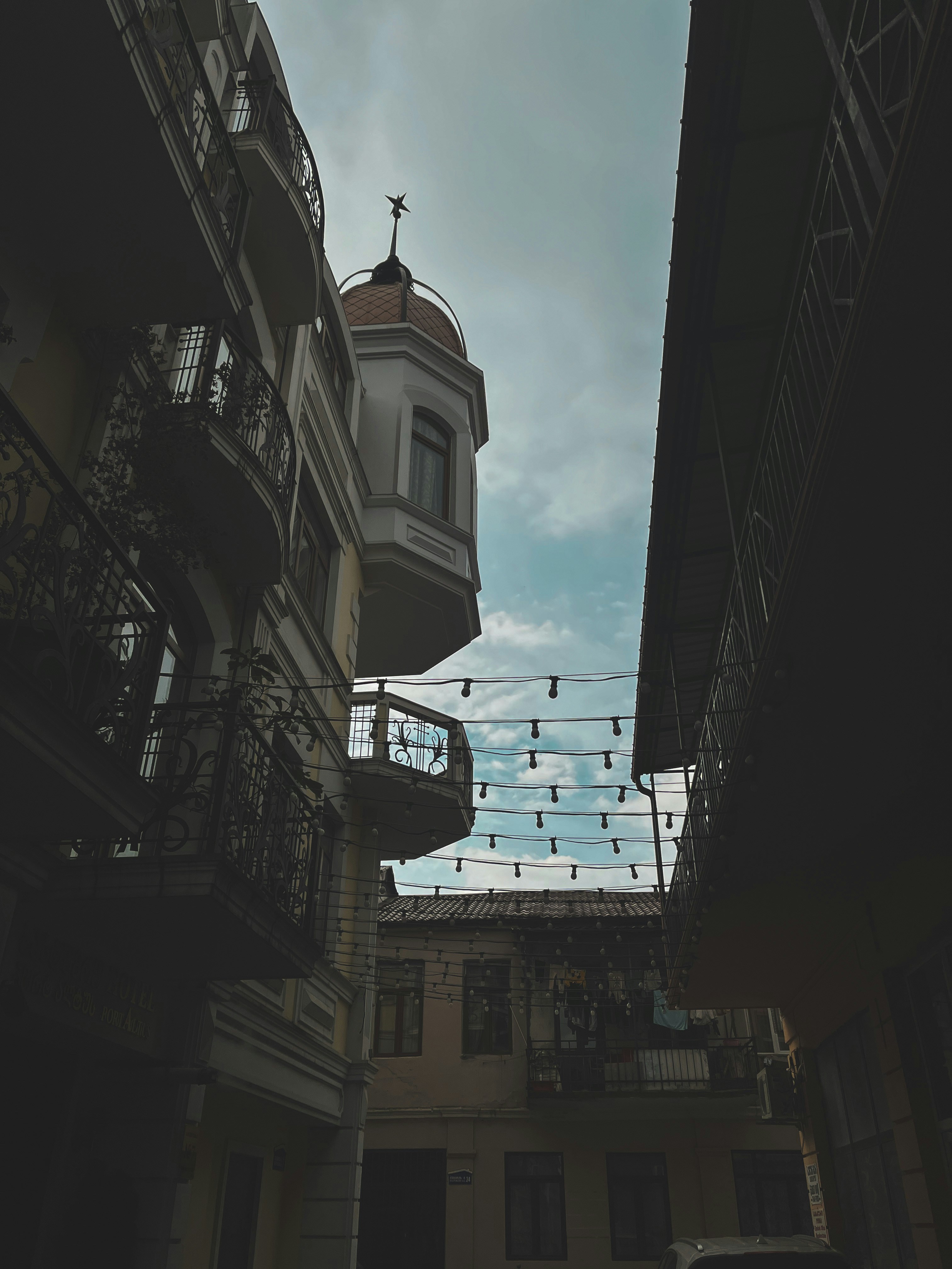 a tall building with a clock on the top of it