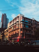 Street view showing lively shops beneath residential apartments.