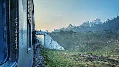 A scenic view of a train traveling through the Canadian landscape.