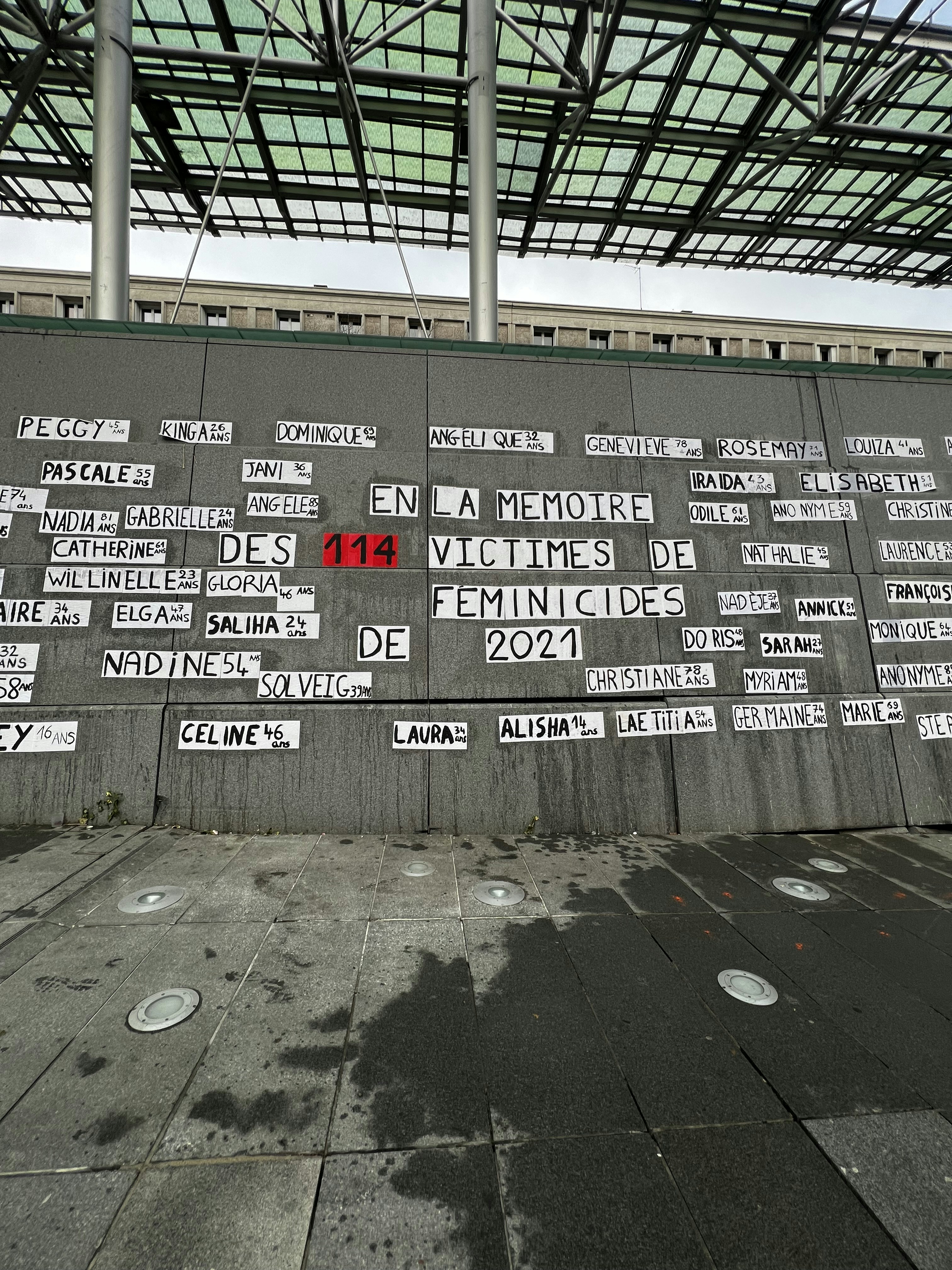 a wall with a bunch of signs on it