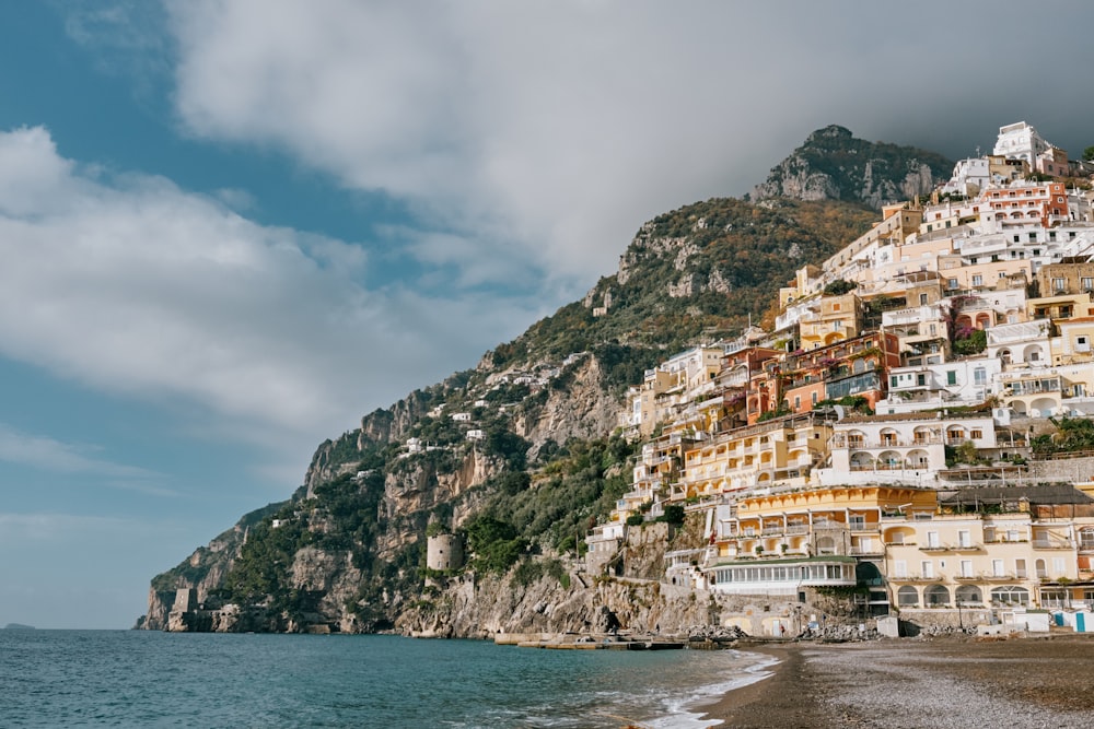 a beach with a bunch of buildings on the side of it