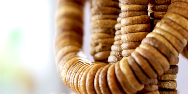 a close up of a bunch of crackers hanging from a hook