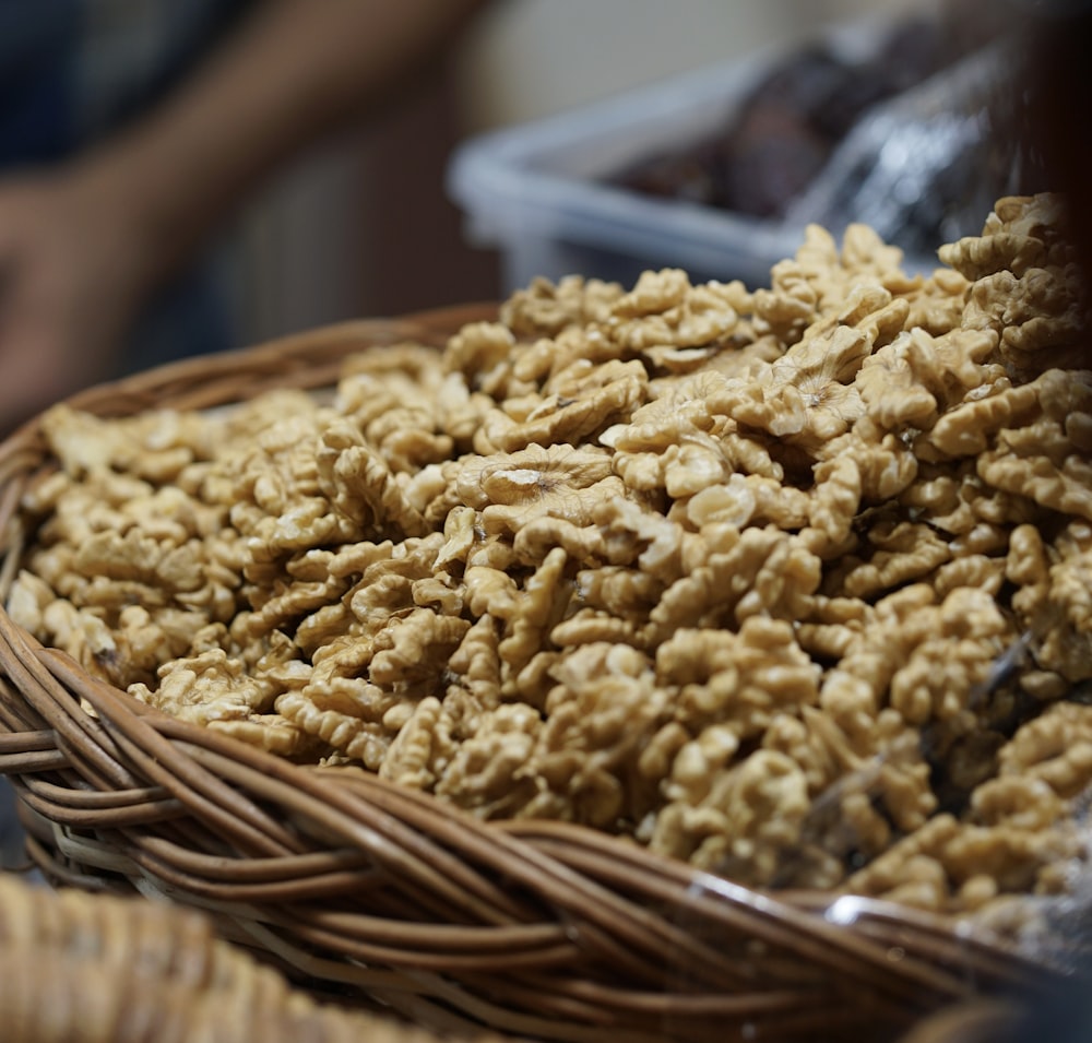 a basket filled with granola sitting on top of a table