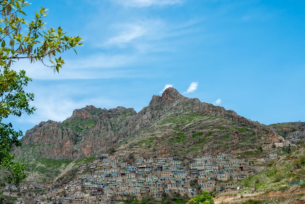 a mountain with a village on top of it
