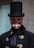 a man in a top hat with a skull on his face
