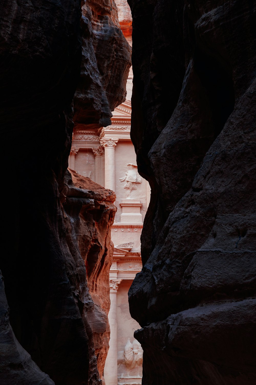 a narrow slot in the side of a mountain