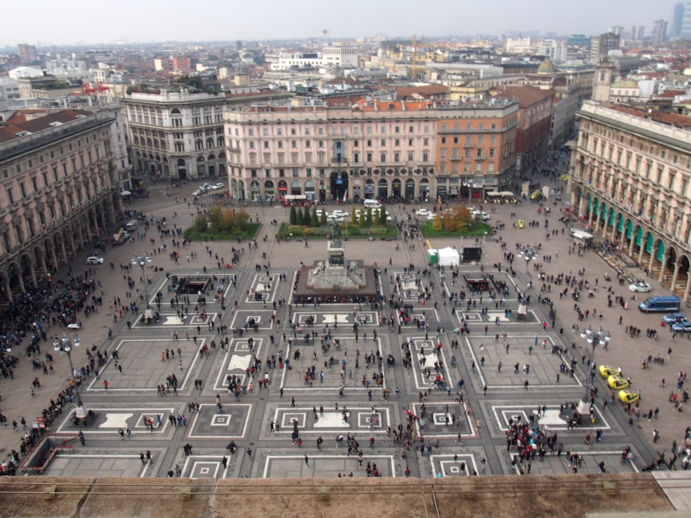 an aerial view of a city square with a lot of people