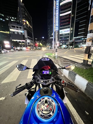 A vibrant 3D rendering of a motorcycle in an urban setting.