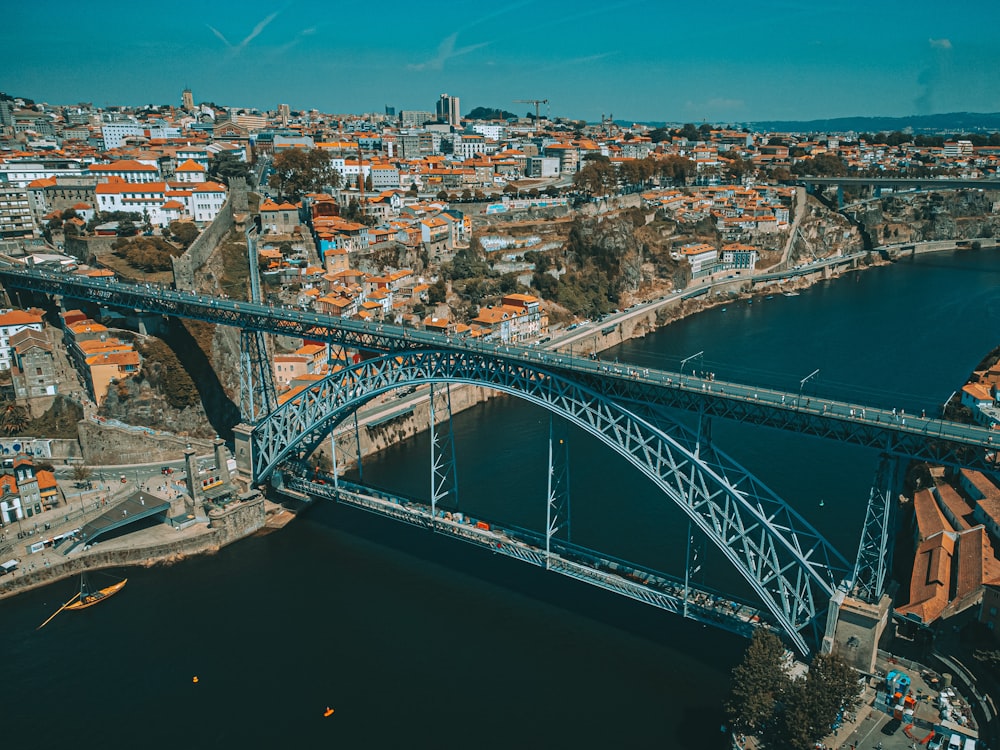 an aerial view of a bridge over a river