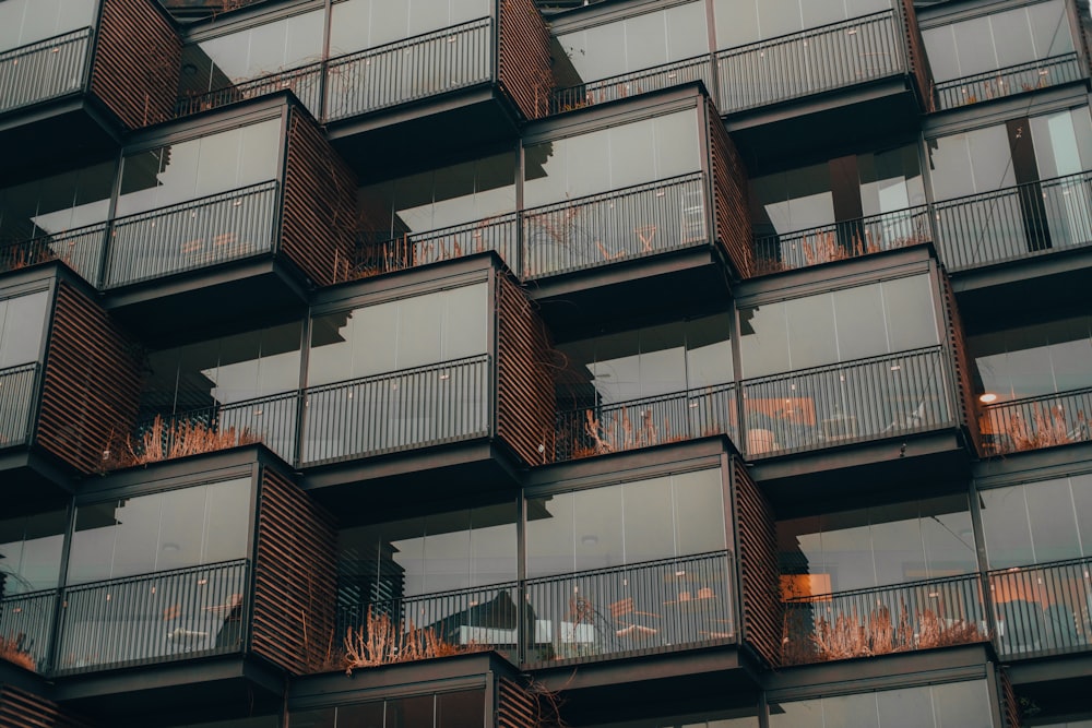 a very tall building with lots of balconies