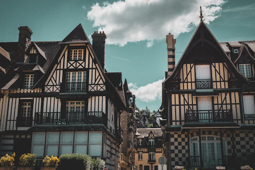 a group of buildings with a sky background