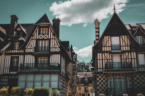 a group of buildings with a sky background