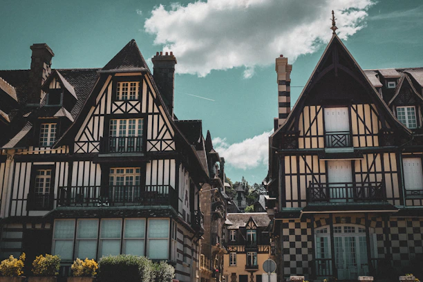 a group of buildings with a sky background