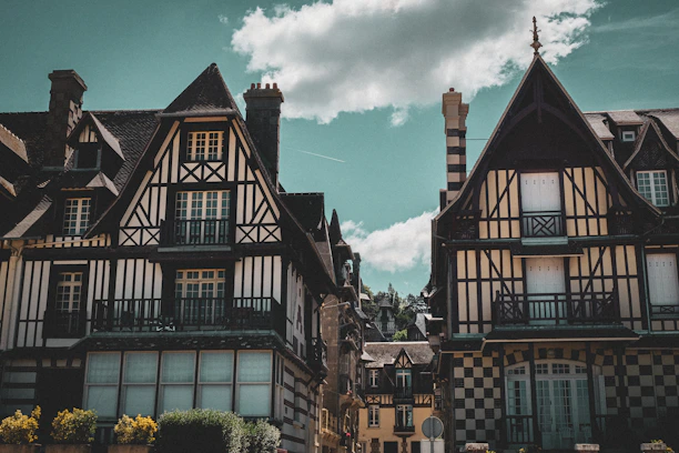 a group of buildings with a sky background