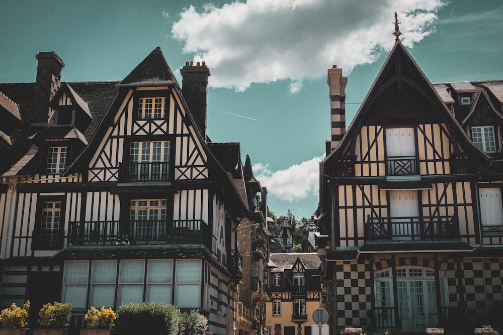 a group of buildings with a sky background