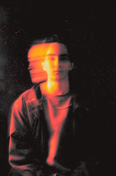 A video frame showing a smooth face swap in motion with consistent facial expressions.