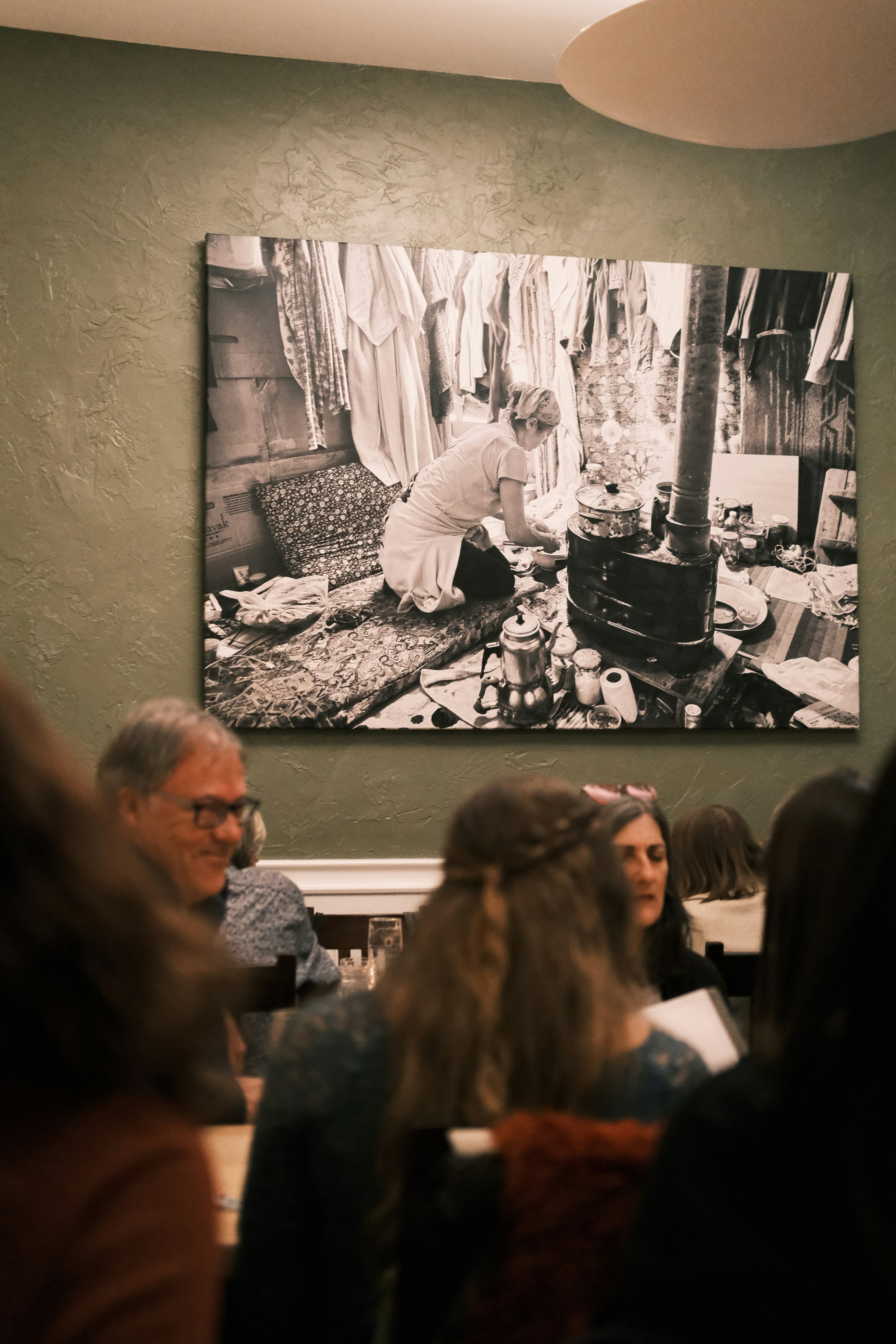 woman wearing yellow long-sleeved dress under white clouds and blue sky during daytime