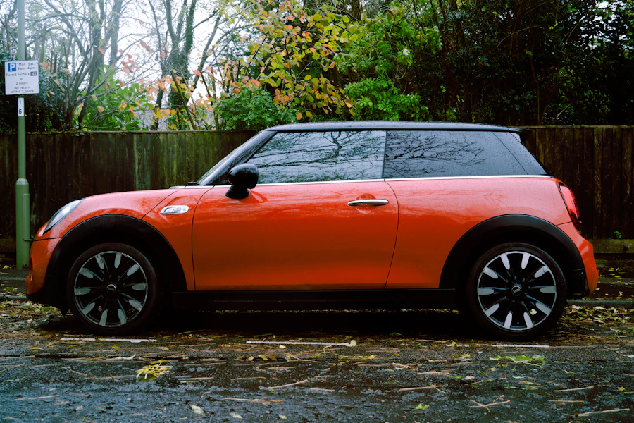 Orange MINI Cooper parked on a driveway