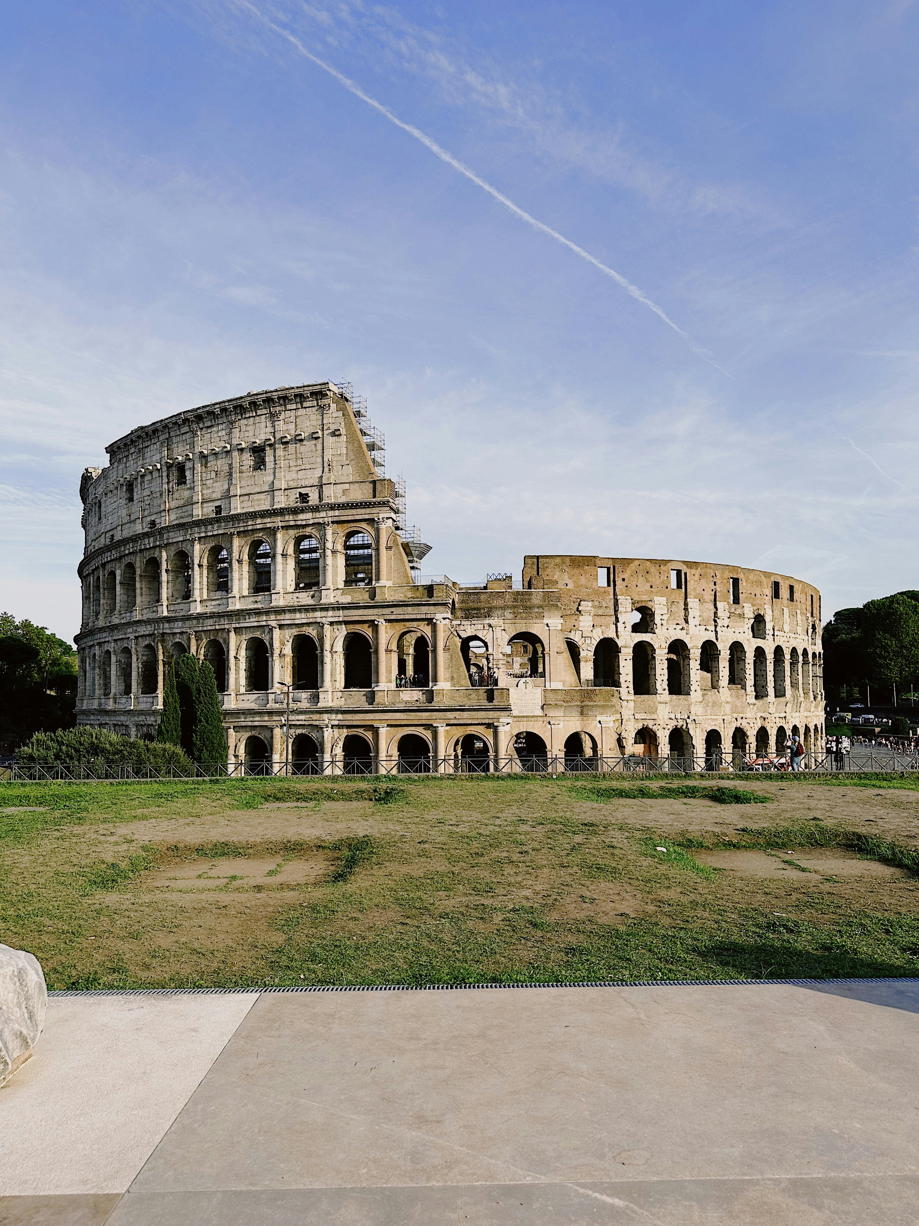 a large building that is in the middle of a field