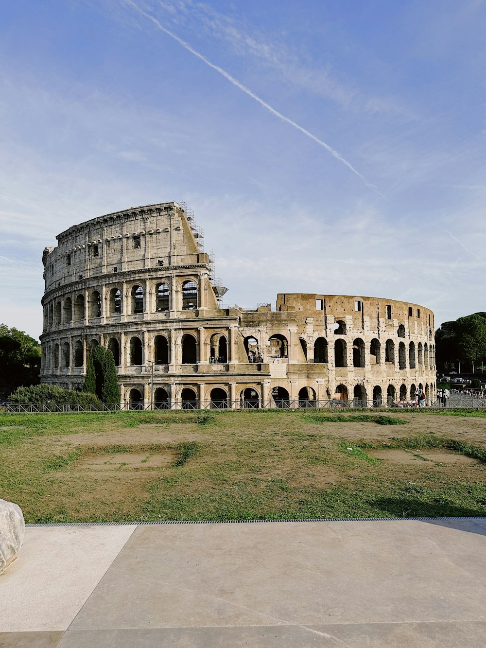 a large building that is in the middle of a field