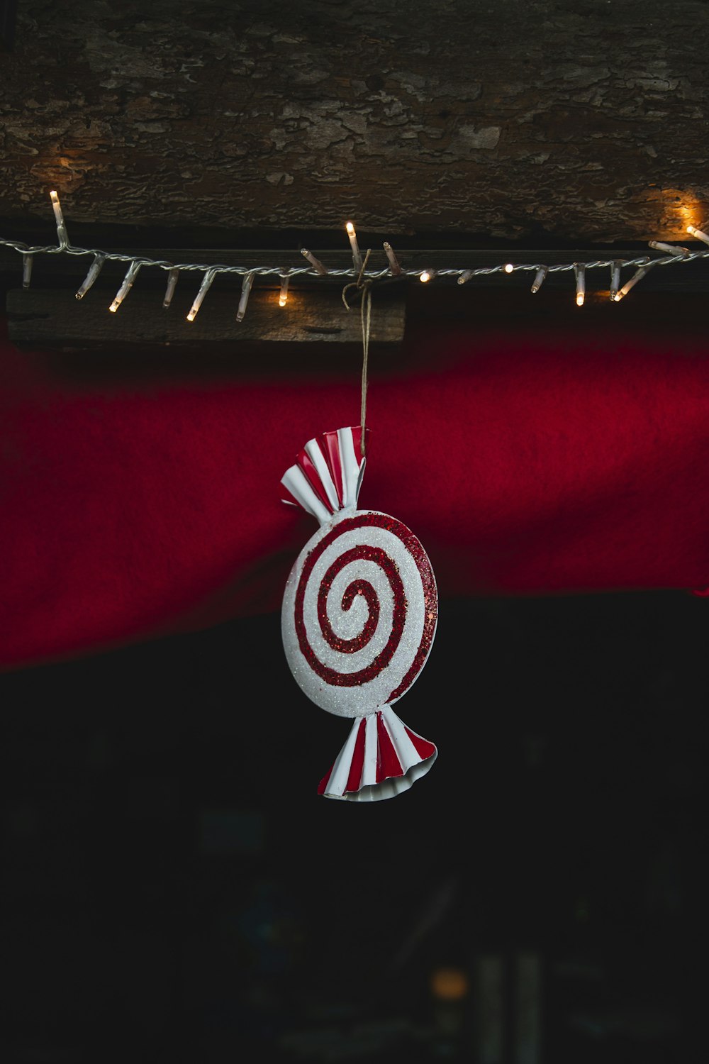 a candy ornament hanging from a ceiling