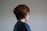 the back of a woman's head with short hair