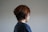 the back of a woman's head with short hair