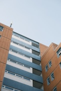 a tall building with a clock on the top of it