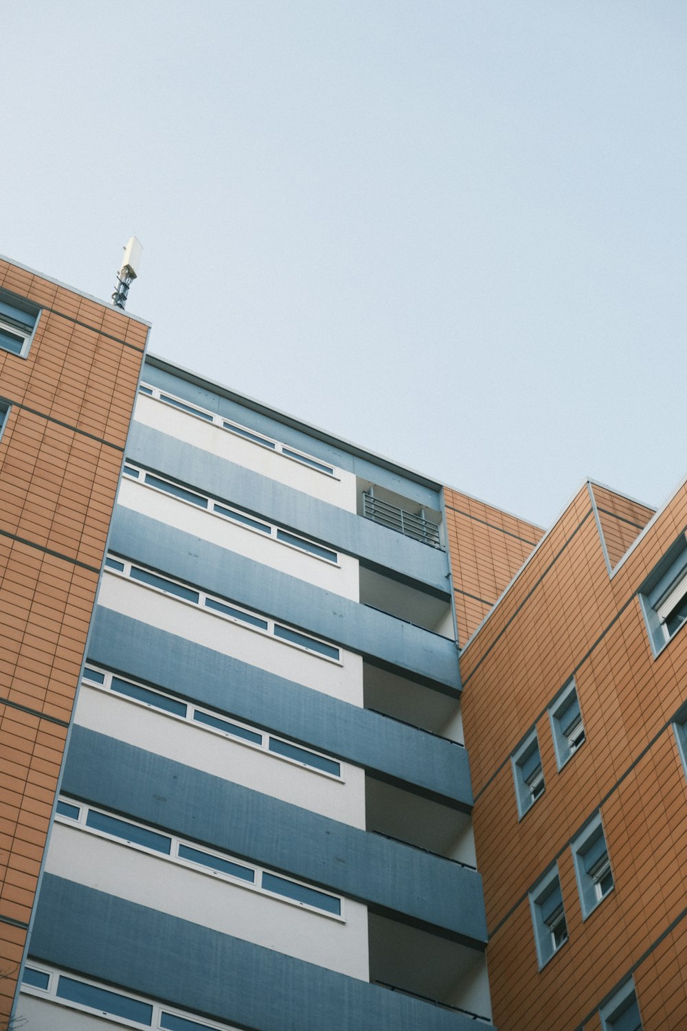 a tall building with a clock on the top of it