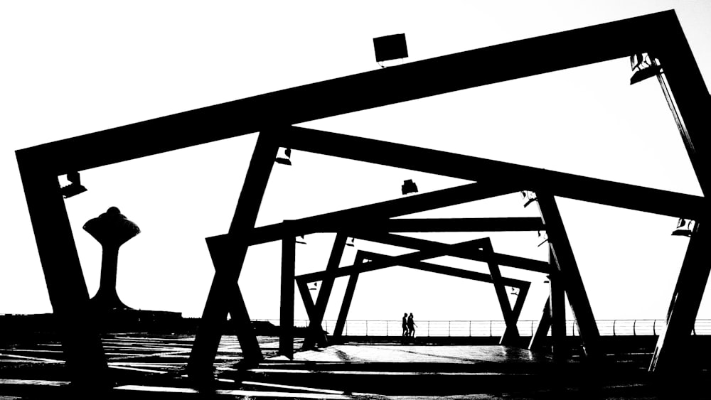 a black and white photo of a large structure