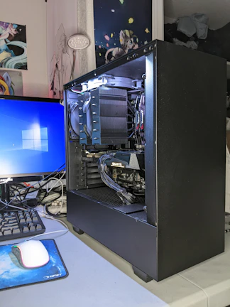 Informative panels showing donation goals, social media links, and PC specs in a clean layout.