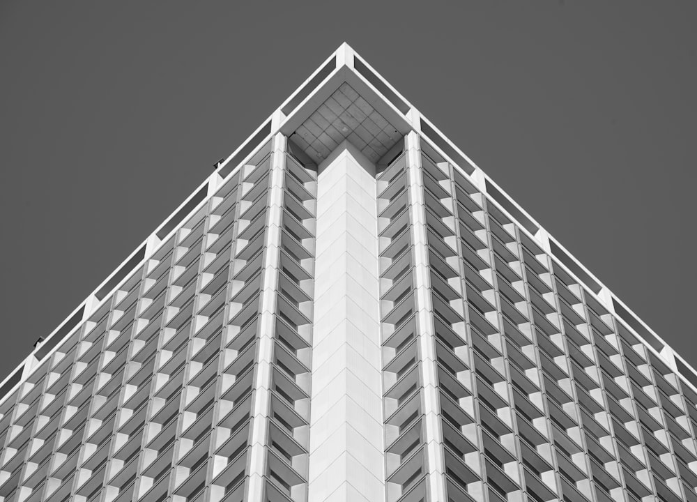 a black and white photo of a tall building