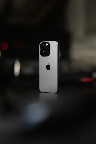 a close up of a cell phone on a table