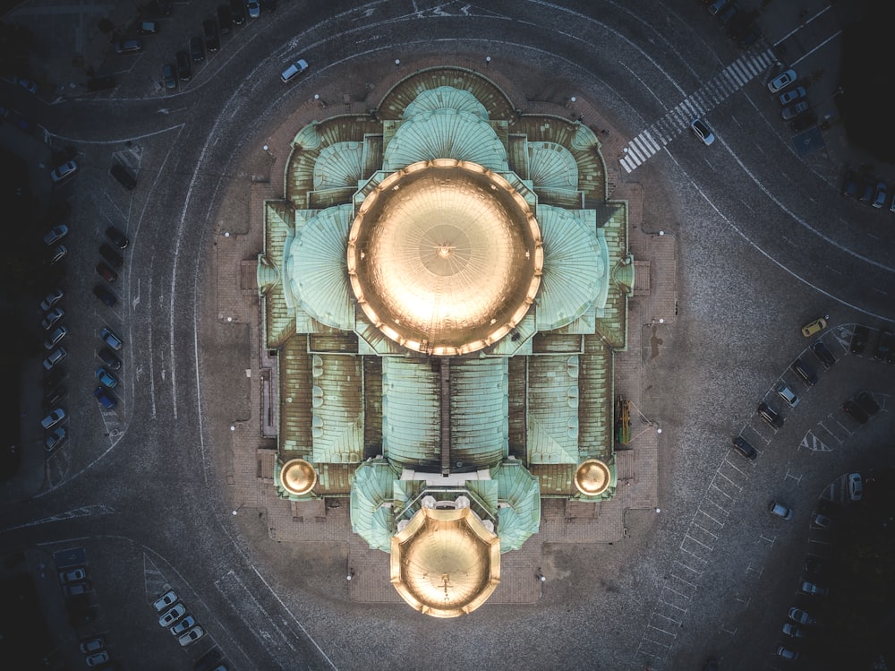 an aerial view of a building in a parking lot