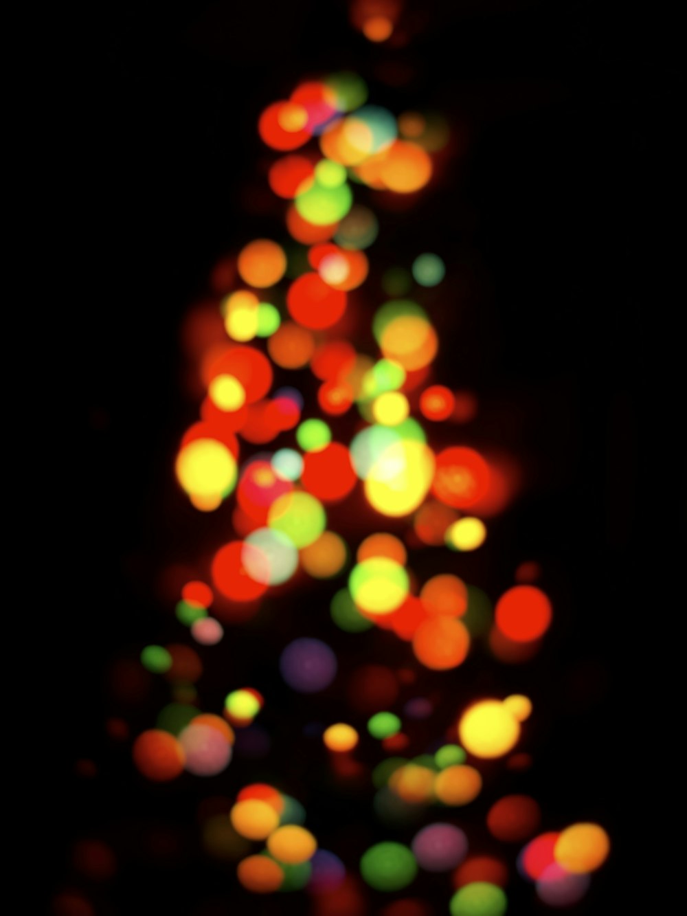 a blurry photo of a lit christmas tree