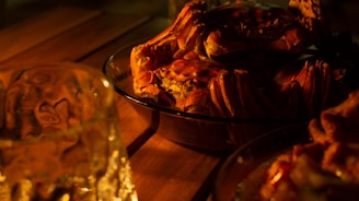 A chef preparing fresh crab in a bright kitchen.