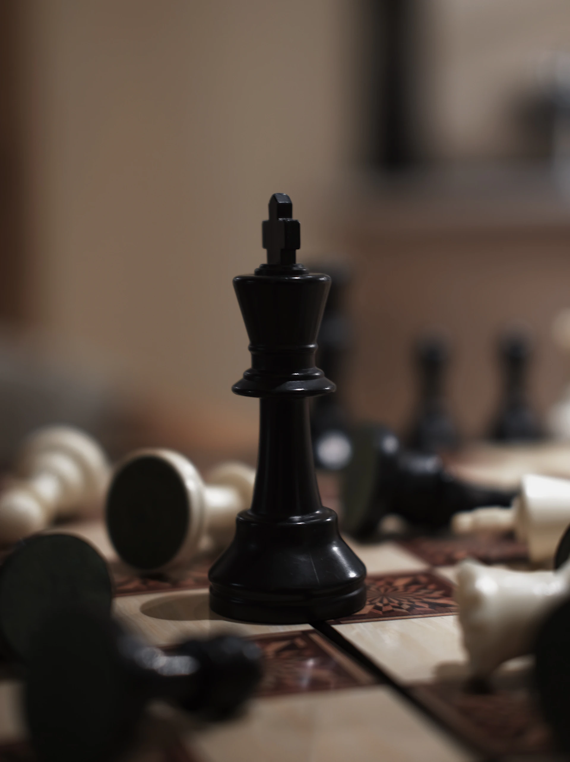 a black and white chess set up on a table