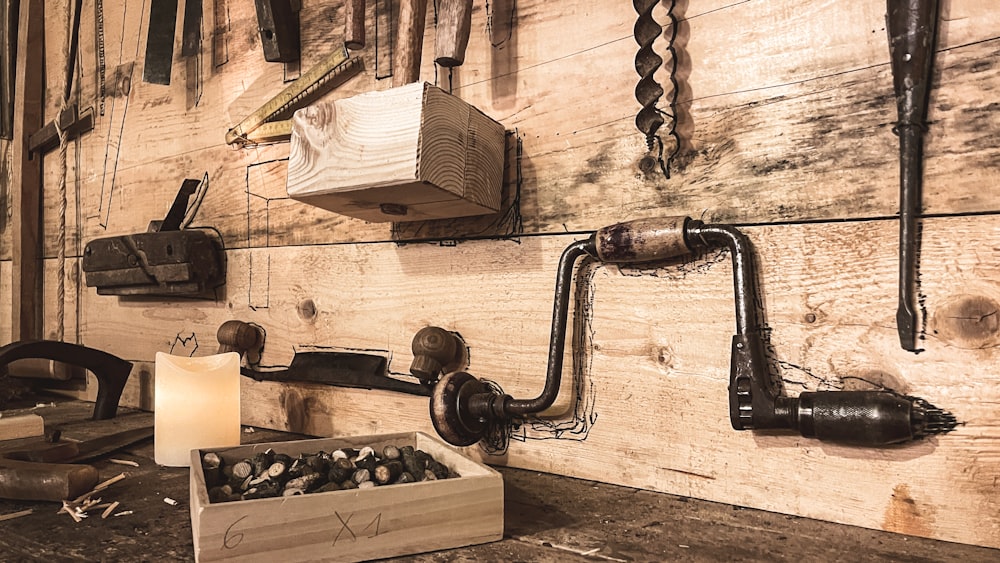 a room with a bunch of tools hanging on the wall