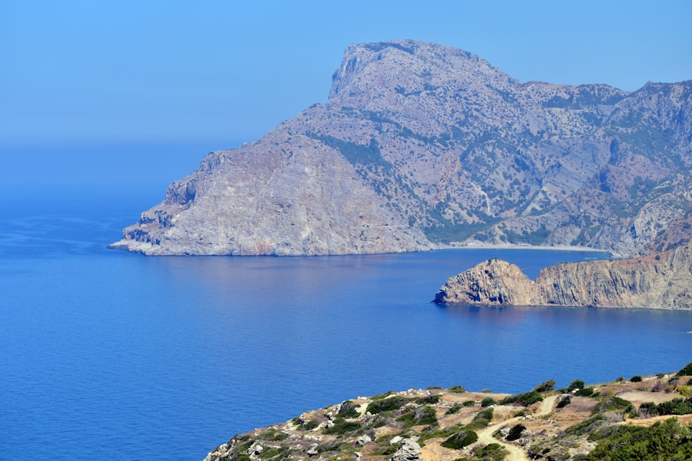 a large body of water surrounded by mountains