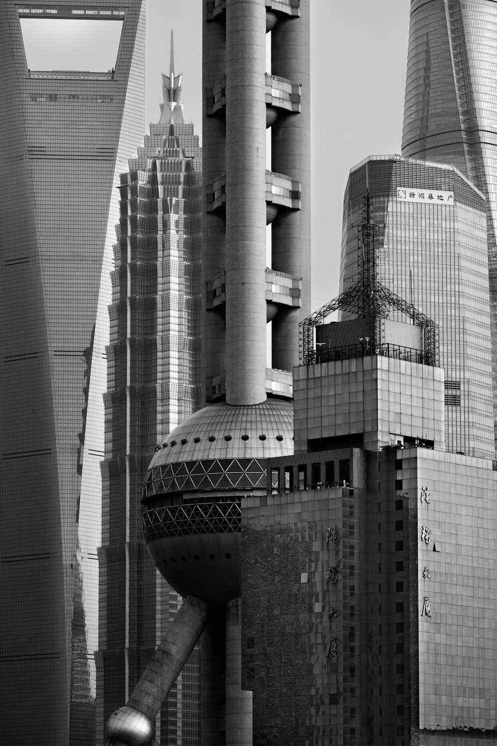 a black and white photo of buildings in a city