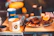 Close-up of a delicious coffee and snack combo on a wooden table with natural light.