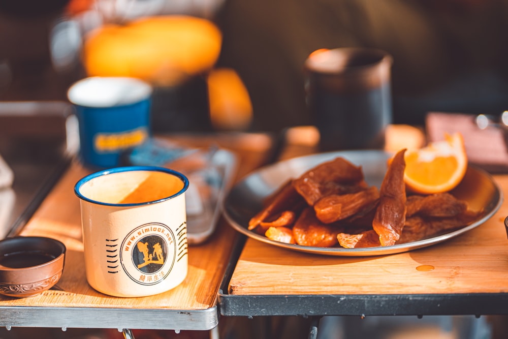 a plate of food sitting on top of a wooden table