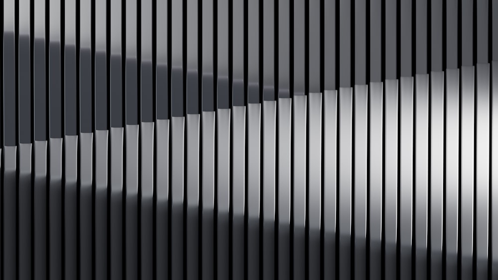 a black and white background with vertical lines