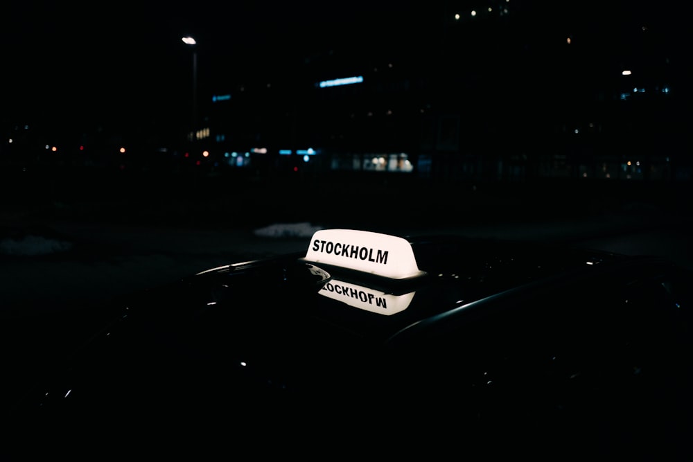 a close up of a police car at night