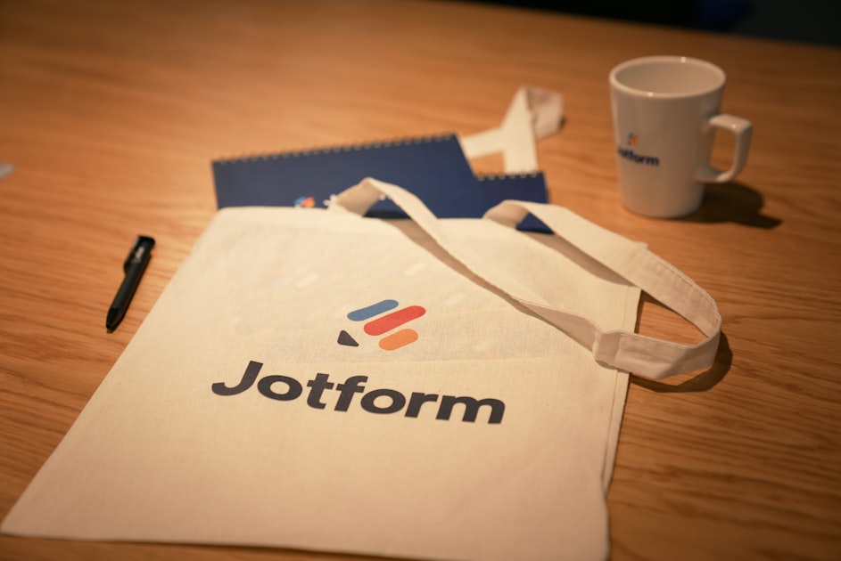 a white bag sitting on top of a wooden table