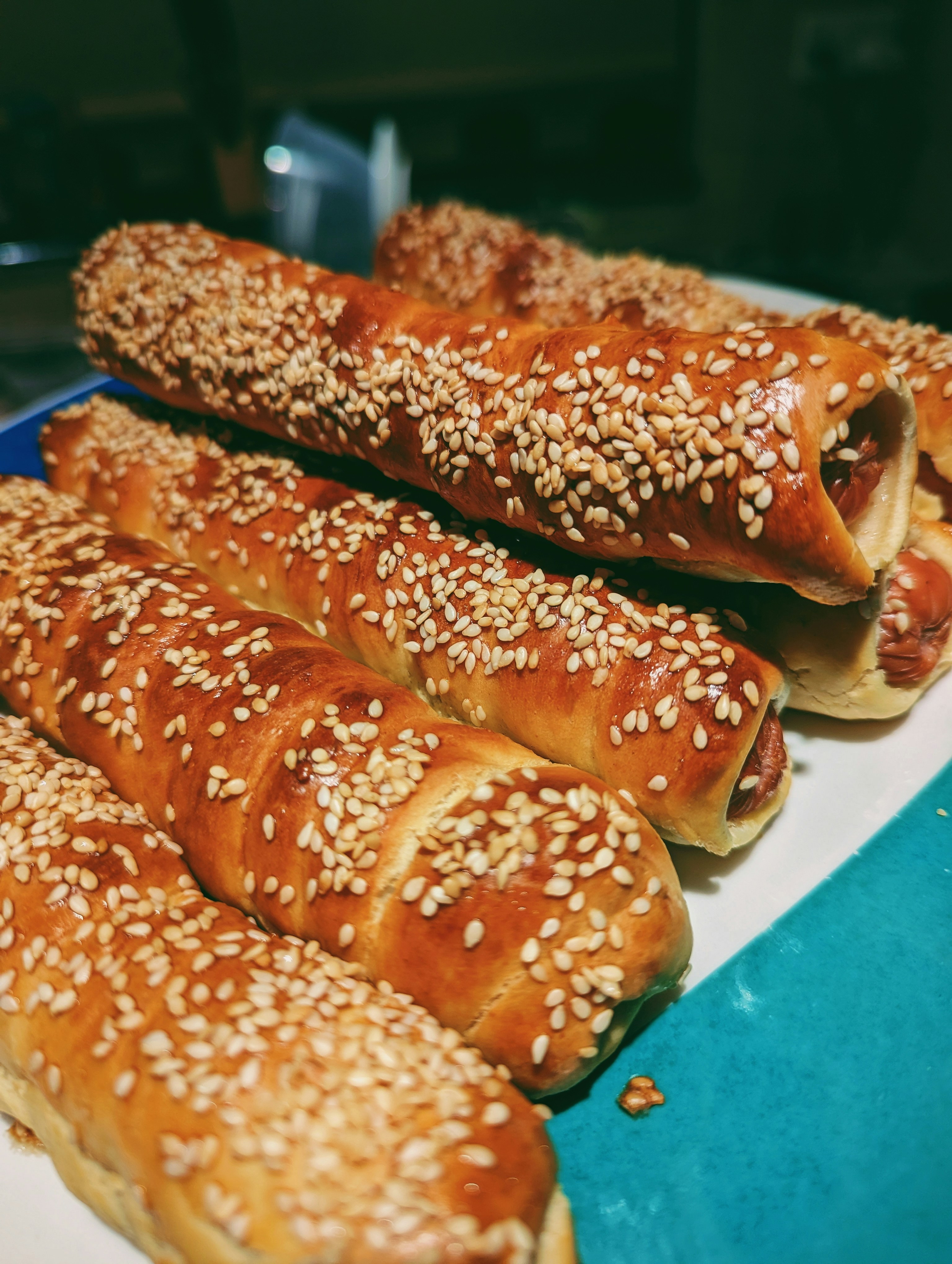 a close up of a plate of hot dogs