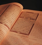 an open book with arabic writing on it